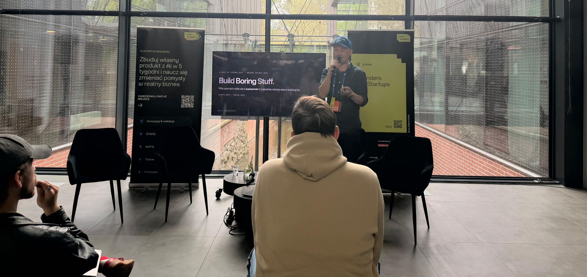 Kieran on stage at No-Code Poland in Gdansk giving a talk titled Build Boring Stuff